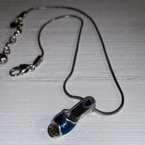 Brighton necklace with a sandal pendant